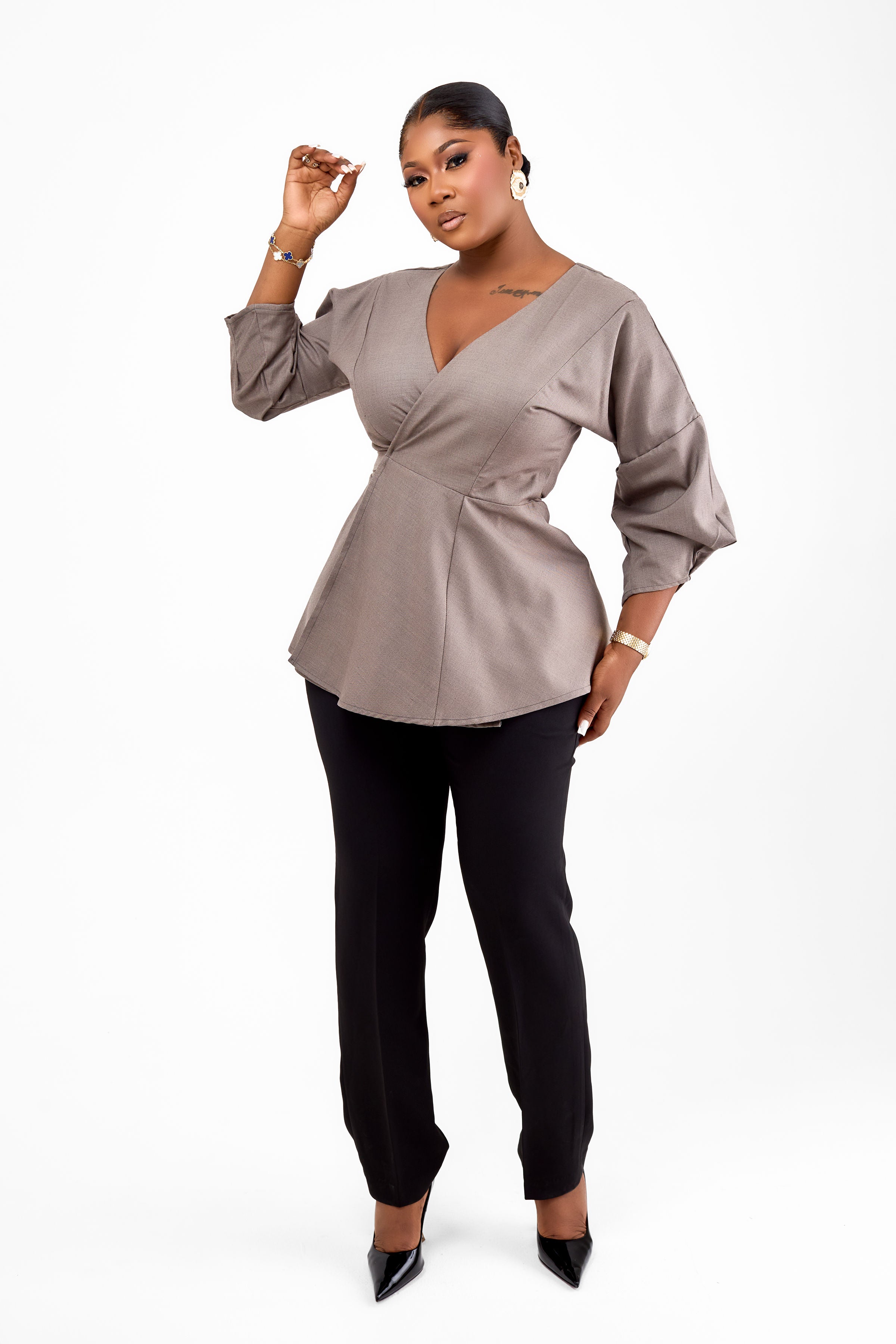 THE STATEMENT BLOUSE